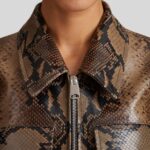 Close-up of cropped brown leather jacket for women