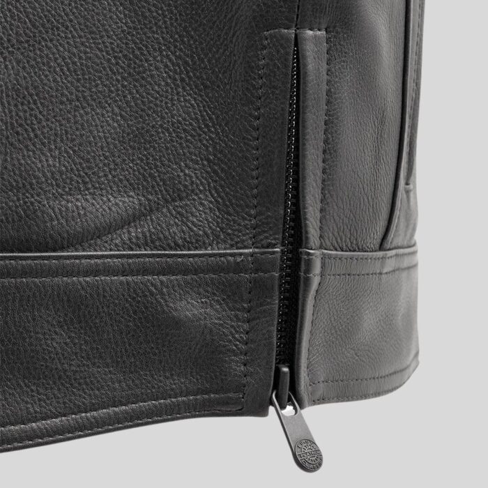 "Close-up of men's black leather vest"