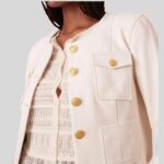 Close-up of a cropped white leather jacket