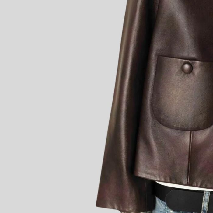 Close-up of brown cropped leather jacket details