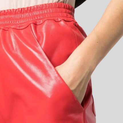 Close-up of red leather shorts