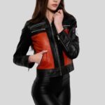 Close-up view of red and black leather jacket