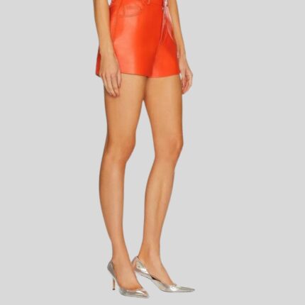 Side view of orange leather shorts