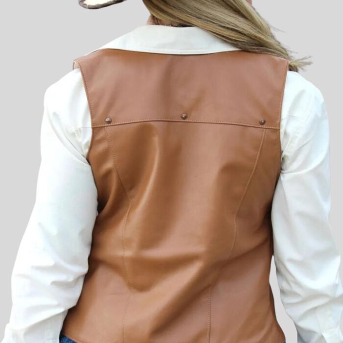 Side view of a brown leather vest