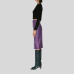 Side view of sophisticated leather purple skirt