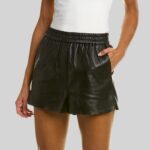 Women's black leather shorts front view