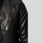 Close-up of black leather hooded biker jacket