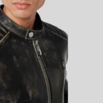 Close-up of men's distressed leather biker jacket