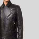 Close-up view of a black leather biker jacket for men