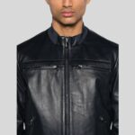 Close-up view of black leather bomber jacket for men