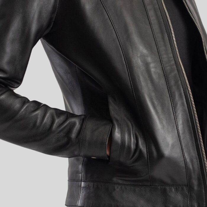 Close-up view of the details on a black leather jacket for women